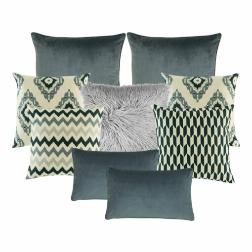A pair of plain grey cushion cover, a pair of cream and grey cushion cover with diagonal patterns, a grey fur cushion, a cushion cover with zigzag pattern, a chevron cushion cover and two plain rectangular cushion in grey