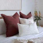 A close-up shot of 4 bed cushions from the Ali set magnifying their colours and designs.