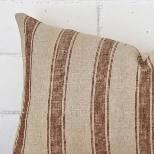 A close up image of this striped rectangle cushion. The image shows details of its designer fabric.