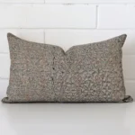 Vibrant floral cushion cover constructed from designer fabric and shown in a rectangle size.