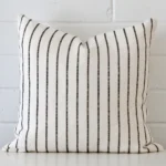 A superior linen cushion cover yielding a striped style and in a classy square size.