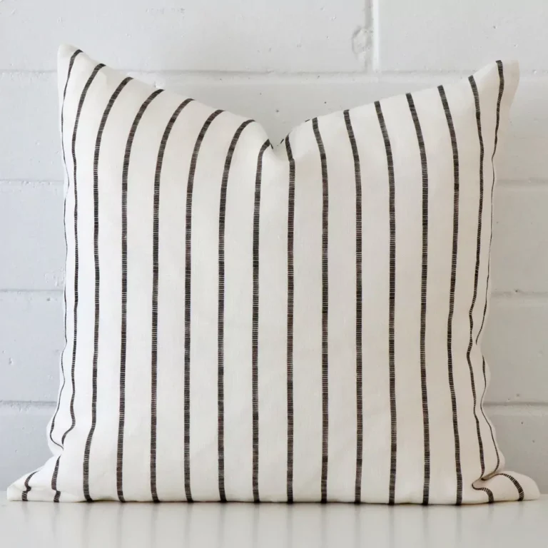 A superior linen cushion cover yielding a striped style and in a classy square size.