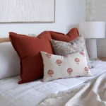 A side-view image of the set of 4 Avery bed cushions.