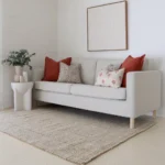 The set of 5 Avery sofa cushions looks perfectly matched with the light grey sofa.