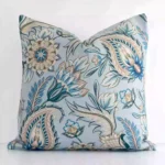 Front view of patterned square cushion. Crafted from a special linen material in a colourful finish.