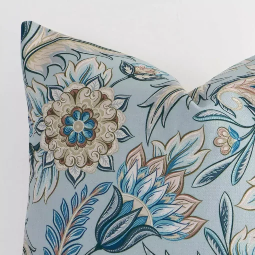 Close up image of linen square cushion. The image allows you to see the colorful hue and patterned style more thoroughly.