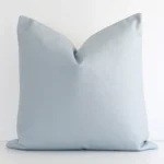 A lovely solid-coloured outdoor cushion in a sleek large size with a soft teal tone of colour.