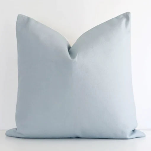 A lovely solid-coloured outdoor cushion in a sleek large size with a soft teal tone of colour.