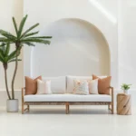 The claybourne set of 3 outdoor couch cushions are displayed on a white sofa.