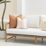 Outdoor living area showcasing 3 outdoor cushions from the Claybourne set.