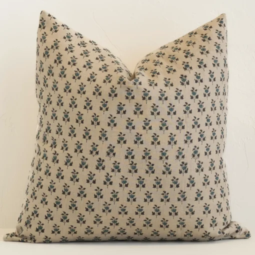 cleo-floral-designer-cushion-cover---art130 An attractive floral linen cushion in front of a white brick wall. It has a large shape and a sand colour.