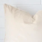 A velvet large cushion’s corner has been enlarged in this shot. The cream colour is more visible.