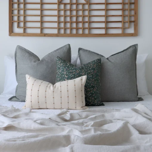 A bed styled with the classy Eden bed cushions set of 4.