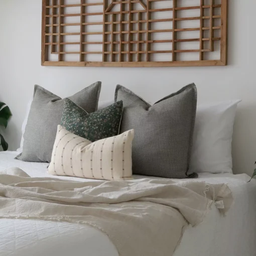 4 Eden designer cushions are shown close up, highlighting their colors and designs with greater detail.