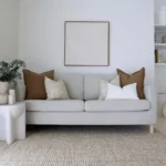 In an airy living room where you will find the Eve sofa cushions set, showcasing 5 sofa cushions arranged neatly.