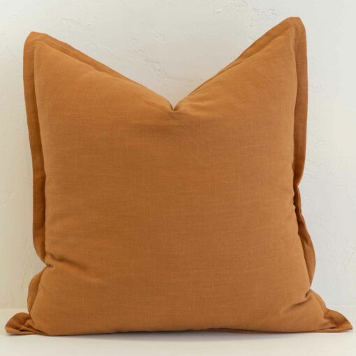 ginger-linen-cushion-cover---large---sc1120-55 Ginger linen cushion with rich warm orange tone and woven texture.