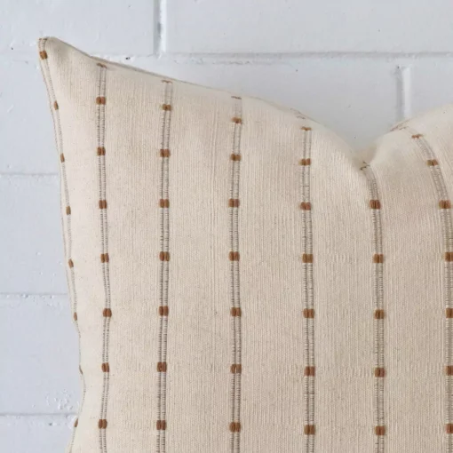 Close up image of top corner of this large striped cushion. This shows the designer fabric up close.