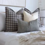 A beautifully designed bed with the Jude bed cushion set consisting of four designer cushions.
