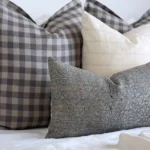A close up shot showing the 4 designer cushions from the Jude bed cushions set.