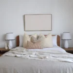4 designer cushions from the Lennox bed set arranged beautifully on a bed.