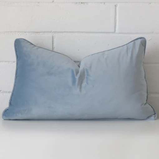 A stunning rectangle velvet cushion in a light blue colour.