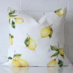 A graceful square cushion made from a durable outdoor fabric.