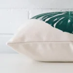 A cushion positioned on its back panel. The shot shows a lateral view of the linen fabric up close.