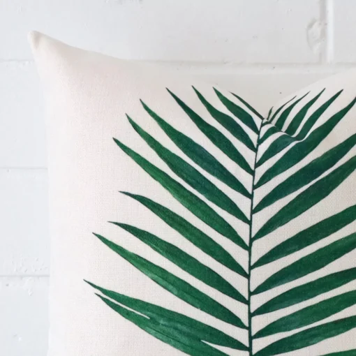 A close up image of this square cushion. The image shows details of its linen fabric.