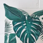 This image shows a cushion cover from a very close range. The square size and linen material are more clearly shown.