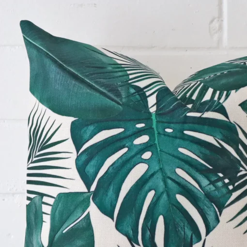This image shows a cushion cover from a very close range. The square size and linen material are more clearly shown.