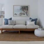 The elegance of the light grey sofa is enhanced by the Mia sofa cushion set, featuring five stylish cushions.