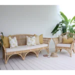 A lovely combination of 7 outdoor mustard lounge cushions in a cozy lounge.