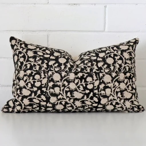 A graceful rectangle cushion with a floral style on durable designer fabric.