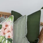 A magnified view of this set of 3 olive outdoor cushion covers corner shows greater detail.