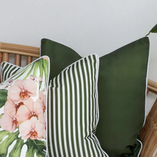 A magnified view of this set of 3 olive outdoor cushion covers corner shows greater detail.