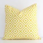 Vibrant yellow geometric cushion cover constructed from outdoor fabric and shown in a square shape.
