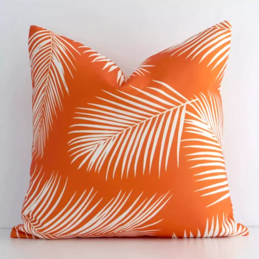 A superior outdoor orange cushion cover yielding a palm printed style and in a classy square size.