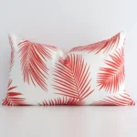 Gorgeous outdoor rectangle cushion in a red palm print colour. It has a charming style.