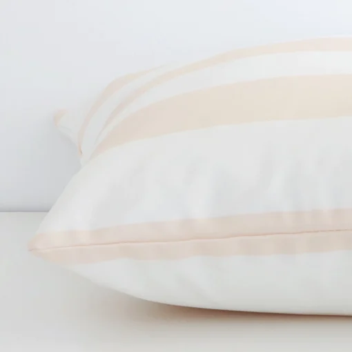 Beige striped cushion cover laid on its back side. The image shows a side-on view of the outdoor material and its large dimensions.