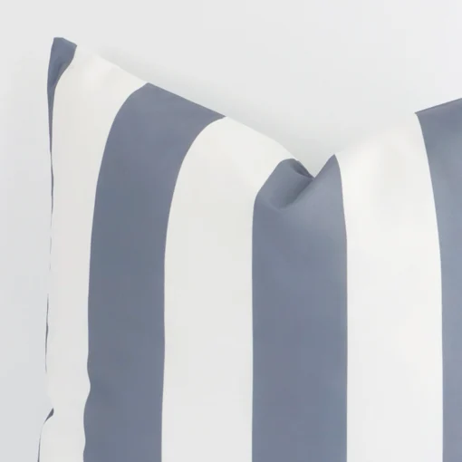 Large outdoor cushion in grey colour sitting upright in front of a white wall. It has been made from a quality outdoor material.
