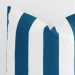Close up image of outdoor large cushion. The image allows you to see the teal hue and stripe style more thoroughly.