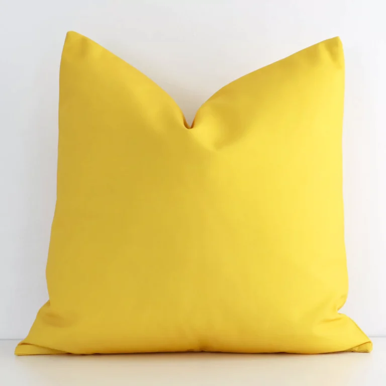 An alluring outdoor square cushion cover in yellow. It features an attractive solid colour style.