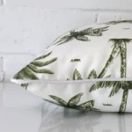 Side image of an outdoor square cushion cover. The olive green colour of its design is shown up close.