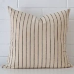 A bold striped designer cushion in a sleek large size.