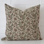 A graceful large cushion with a floral style on durable designer fabric.
