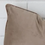 A velvet rectangle cushion’s corner has been enlarged in this shot. The detail of the rectangle colour is more visible.